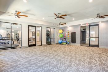 Oaks 55 active apartments in euless, tx  76039 - fitness room